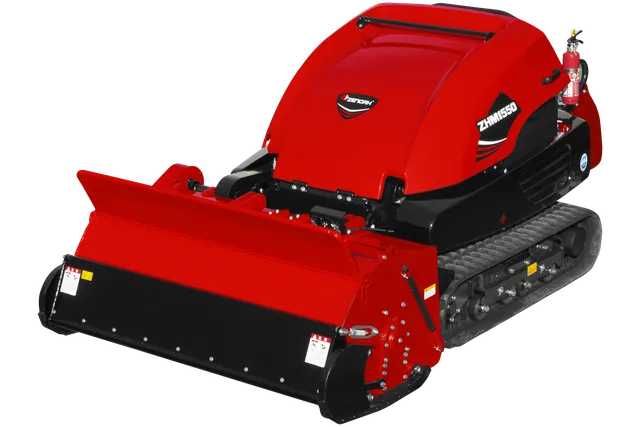 ZHM1550. 履帯と大きなフロントアタッチメントを備えた建設車両の側面図。