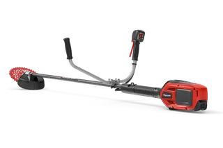 エルゴノミクスのハンドルとカッティングブレードを備えたHusqvarnaブラッシュカッターの側面図。